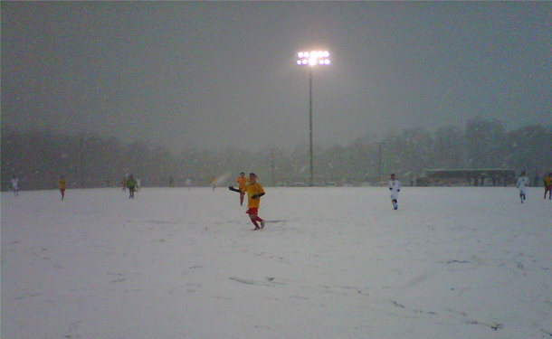 Academy Play In Snowy Whiteout Conditions